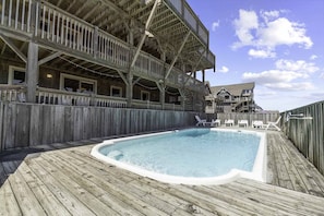 Just steps from the beach, the ground level 13-foot by 29-foot pool is bathed in morning and mid-afternoon sun.