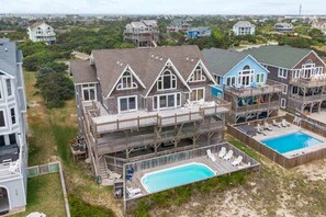 With three levels of decking that run the length of this expansive 8-bedroom home, the views alone are just some of the jewels to fill a treasure trove of memories.