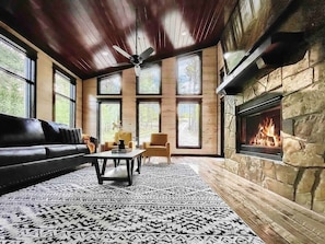 Relax in style and comfort in this spacious great room, perfect for kicking back and watching your favorite show! *Indoor fireplace is shut off between May through end of October*