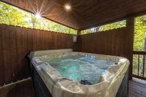 Sit back and relax in the hot tub while catching up on your favorite show.!