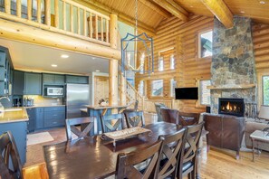 Dining table seats 8 plus three barstools at breakfast bar