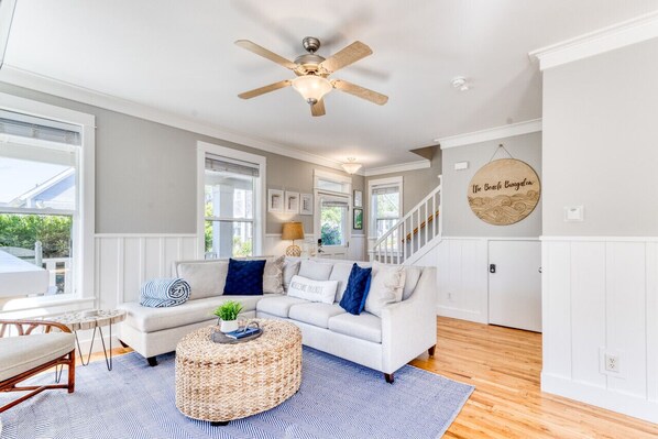 Living Room with ceiling fan that comes in handy during the summer when temps reach the 70s