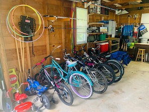 ADVENTURE SHED! Full of 8 bikes, 4 kayaks, canoe, fishing gear, helmets/life jackets, bags, washers, golf sets, balls, badmitten/volleyball, darts, kids toys!