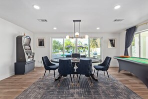 Enjoy your own private casino room, featuring a poker table, roulette, and a slot machine pre-loaded with credits for you to be able to free play!