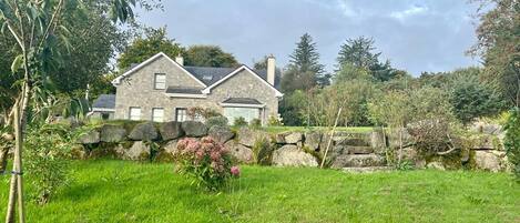 Rowan Cottage in tiered garden setting