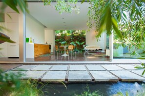 garden pond into kitchen/ living room