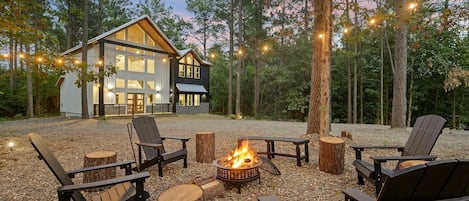 Welcome to Range Life - your modern luxury escape nestled in the pines of Broken Bow!