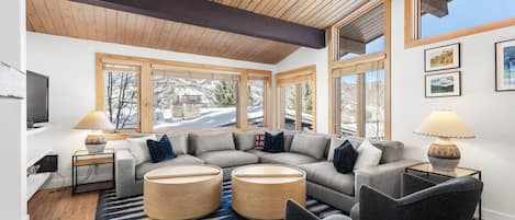 Vaulted ceilings and contemporary furnishings create a bright and inviting space to enjoy your time in Snowmass.