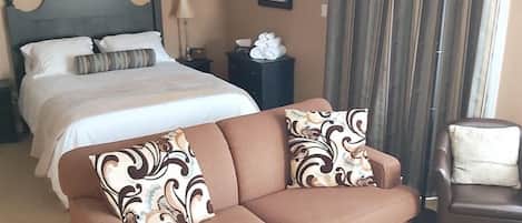 Cozy comfortable bedroom with hotel rated mattress for a great night sleep. Open to lovely living space with fireplace, smart tv and wifi