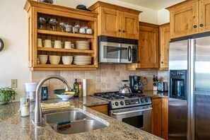 The fully-stocked kitchen is ready to cook delicious meals.