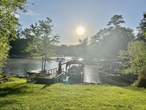Enjoy the beautiful summer sunsets from the upper level screened in porch. 