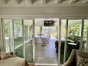 View out to the enclosed outdoor dining/sitting area. 