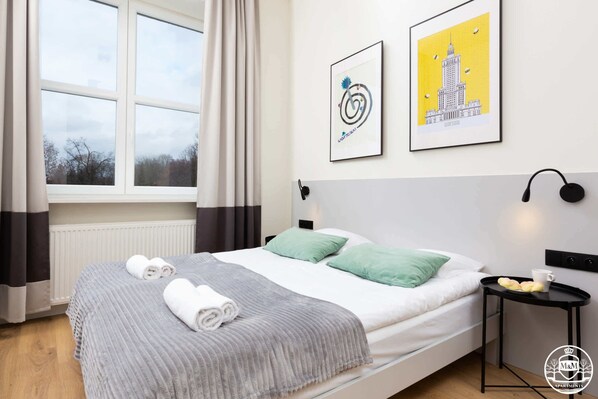 Comfortable double bed in the living room.