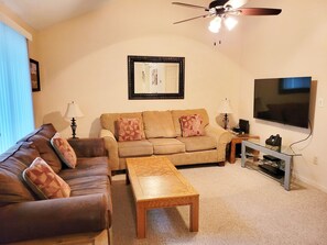 Living Room has a Flat Screen TV wirh Roku