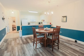 Breakfast bar next to the kitchen and table