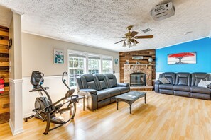 Living Room | Single-Story Home | Fireplace | Elliptical Machine