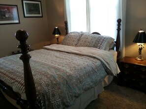 Comfortable queen bedroom with loads of closet space.