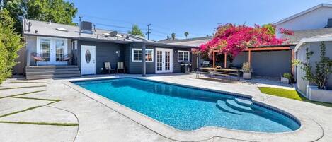 Sunny backyard, brand new sparkling pool, multiple seating areas & your choice of sun or shade!