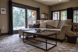 Cozy living room with lots of blankets and pillows!