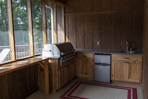 Screened-in outdoor kitchen