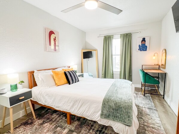 Unwind with a TV in your bedroom and stay productive with a dedicated workspace. #Relax #Workstation