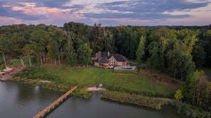 Welcome to Veazey Cove! This stunning home on the lake is sure to enchant and entertain the entire family!