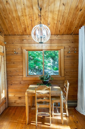 Table and chairs just inside the front door