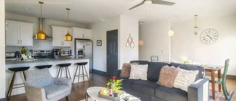 Open living room and kitchen, perfect for all to relax and recharge!