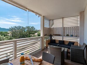 Table, Property, Sky, Building, Shade, Wood, Cloud, Interior Design, Porch, Tableware