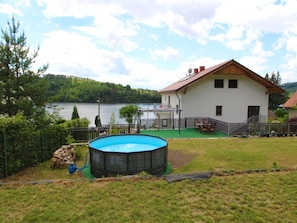 Cloud, Sky, Plant, Building, Water, Swimming Pool, Tree, House, Outdoor Furniture, Shade
