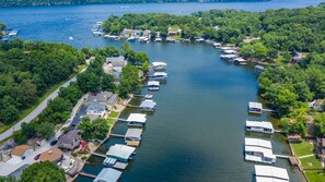 Our deck & dock are lower left w red umbrella. Lake main channel is at the top.