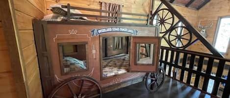 Loft: Very unique Stagecoach twin over twin bunk beds in the loft!