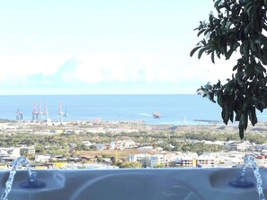 ENJOY THE SPA WHILE WATCHING A BOAT ENTER THE HARBOUR