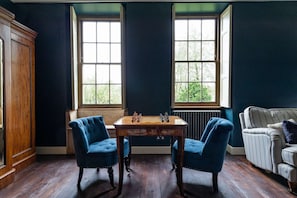 The games table with roulette, chess, draughts and cards