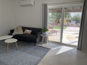 Opens onto a large south facing covered patio. 