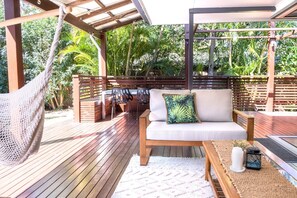 Covered deck and outdoor entertainment area.