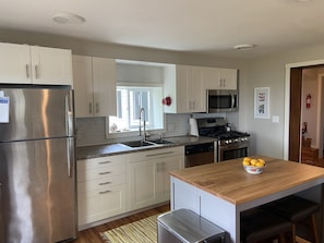 Kitchen with Island that seats 2. 