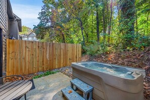 Your private hot tub patio, with seating and easy in & out access