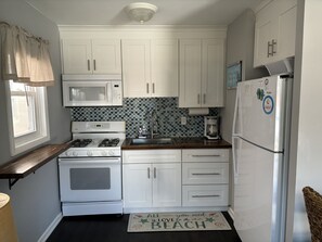 Kitchen with full-size appliances and necessities to make you feel at home.