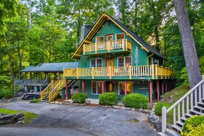 Welcome to Chimney Rock Chalet, all three floors, accessible via the bottom-level front door or the yellow stairs to the left. Relax on the porch and listen to the sounds of the Broad River while gazing at Chimney Rock State Park.