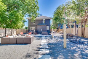 Newly renovated backyard includes a hammock, hot tub and plenty of seating!