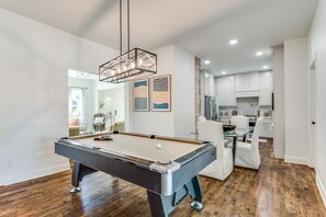 Newly felted Pool table located conveniently next to the dining table