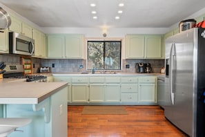 Spacious kitchen as viewed from the table.