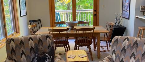 Swivel chairs open to dining area 