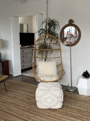 Relax in the hanging egg chair with a nice book and hear the sound of the ocean.