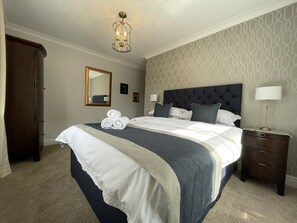 Towels and luxury bed linen are provided