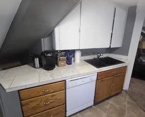 Kitchenette with Keurig, Toaster, Knives and Cooking Utensils