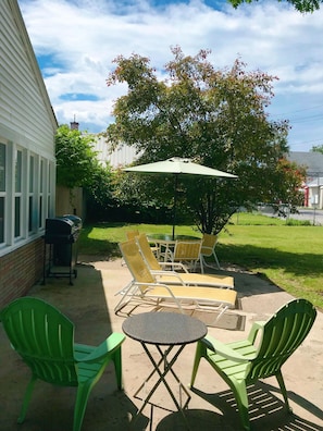 Patio with furniture and grill