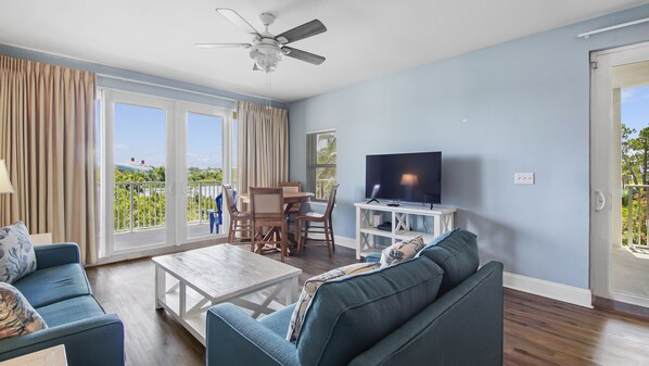 Lakefront Living Area with Flat Screen TV, Sleeper Sofa and Private Balcony Access
