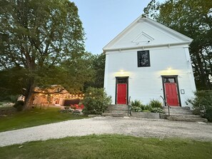 From 1861 to 1958 the kids filed through the massive, newly restored doors of the schoolhouse which sits up on a hill. The original granite steps have been reset after shifting over the years.